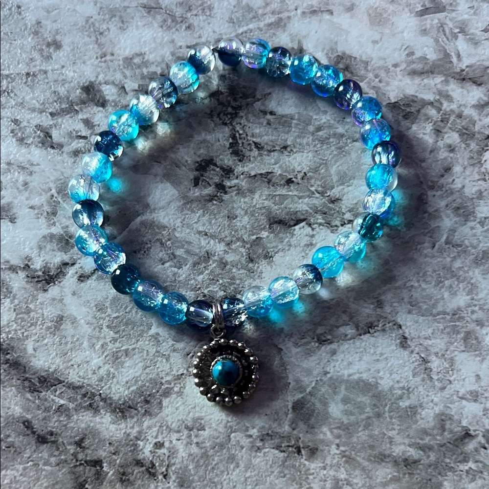 Blue Beaded Bracelet with Silver Charm